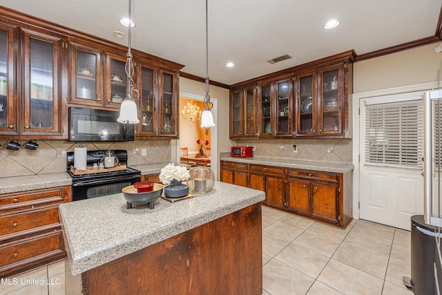 116 Hidden Hills Dr, Madison, MS 39110 - kitchen featuring black appliances, crown molding, decorative backsplash, light tile patterned flooring, and recessed lighting