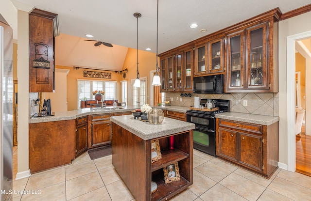 116 Hidden Hills Dr, Madison, MS 39110 - kitchen featuring black appliances, a peninsula, open shelves, light tile patterned flooring, and lofted ceiling