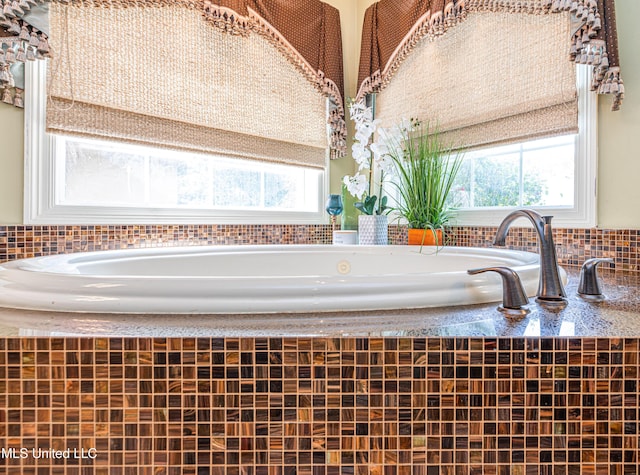 116 Hidden Hills Dr, Madison, MS 39110 - bathroom view of a garden tub and tasteful backsplash