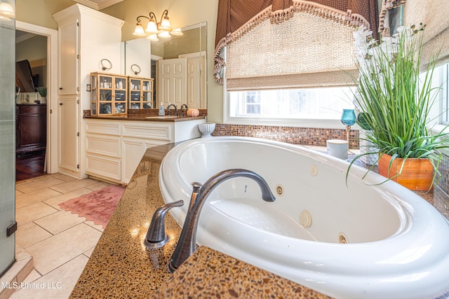 116 Hidden Hills Dr, Madison, MS 39110 - full bathroom featuring vanity, a tub with jets, and tile patterned flooring