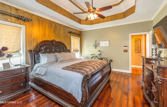 116 Hidden Hills Dr, Madison, MS 39110 - bedroom featuring a raised ceiling, dark wood-style flooring, ornamental molding, and a ceiling fan