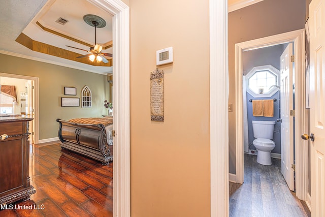 116 Hidden Hills Dr, Madison, MS 39110 - corridor featuring dark wood-type flooring, crown molding, and a raised ceiling