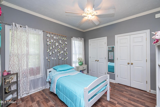 116 Hidden Hills Dr, Madison, MS 39110 - bedroom featuring multiple closets, wood finished floors, crown molding, ceiling fan, and a textured ceiling