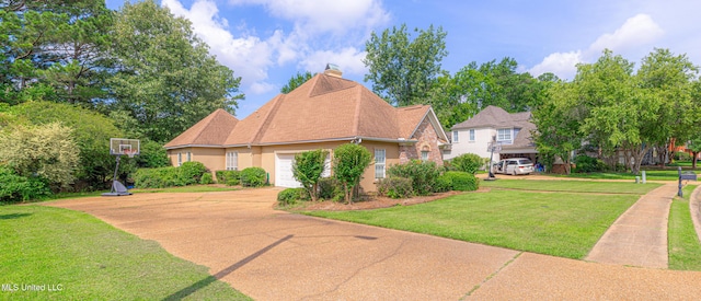 116 Hidden Hills Dr, Madison, MS 39110 - view of front of house with a front yard, driveway, a garage, and a chimney