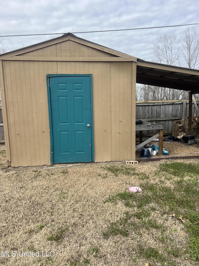 view of shed with a carport