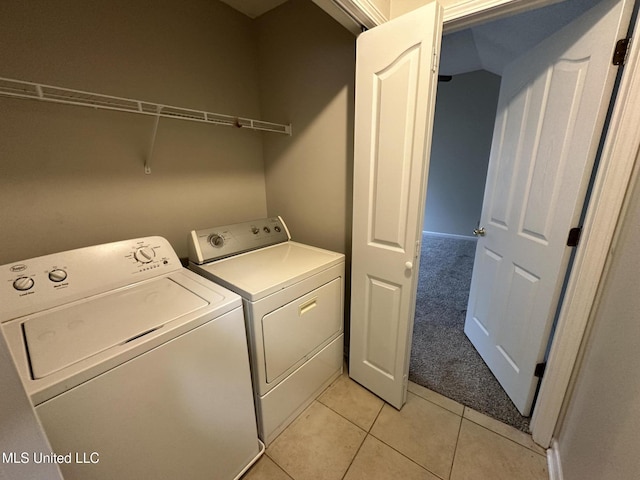 1664 Thomas St, Horn Lake, MS 38637 - washroom with independent washer and dryer, light tile patterned floors, and light colored carpet