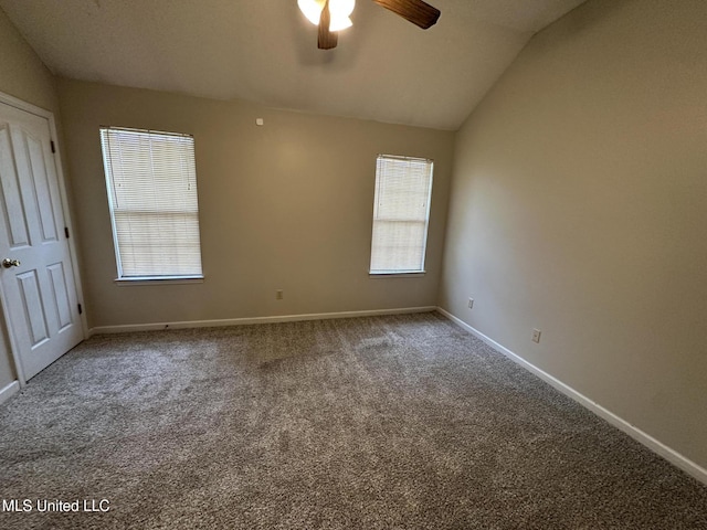 1664 Thomas St, Horn Lake, MS 38637 - carpeted spare room featuring ceiling fan, lofted ceiling, and baseboards