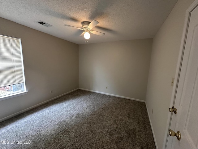 1664 Thomas St, Horn Lake, MS 38637 - carpeted empty room featuring a ceiling fan, a textured ceiling, and baseboards