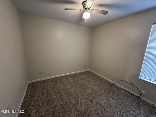 1664 Thomas St, Horn Lake, MS 38637 - empty room with carpet flooring, a ceiling fan, and baseboards