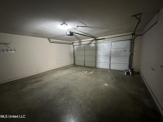 1664 Thomas St, Horn Lake, MS 38637 - garage with a garage door opener and baseboards