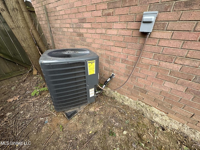 1664 Thomas St, Horn Lake, MS 38637 - exterior view of central air condition unit and brick siding