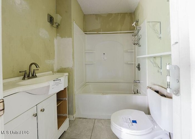 full bathroom with toilet, vanity, tile patterned floors, and tub / shower combination