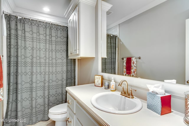 bathroom featuring toilet, ornamental molding, a shower with shower curtain, and vanity