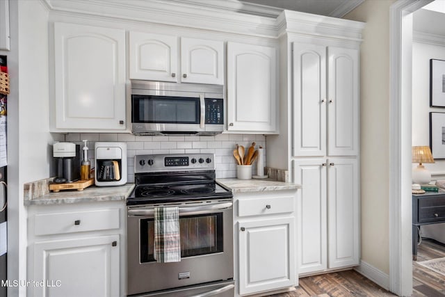 kitchen featuring white cabinetry and stainless steel appliances