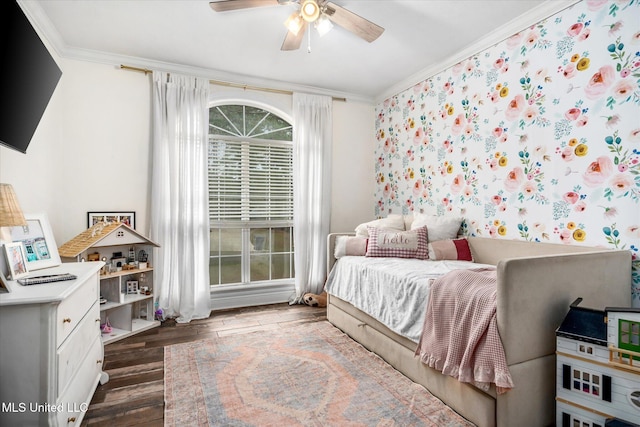 bedroom with ceiling fan, dark hardwood / wood-style floors, and ornamental molding