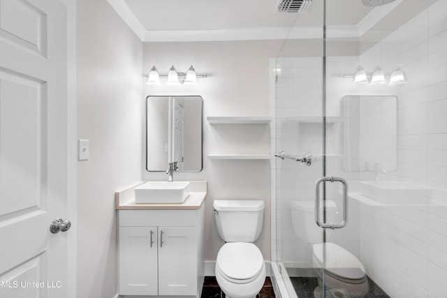 full bath with visible vents, a shower stall, crown molding, toilet, and vanity