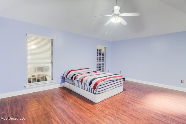 6909 N Rue Mornay, Biloxi, MS 39532 - bedroom with wood finished floors and ceiling fan