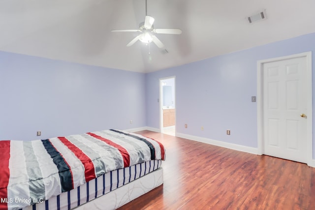 6909 N Rue Mornay, Biloxi, MS 39532 - bedroom featuring wood finished floors, lofted ceiling, and ceiling fan