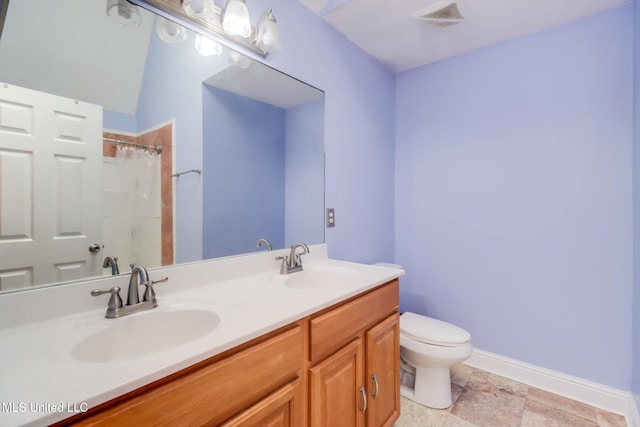 6909 N Rue Mornay, Biloxi, MS 39532 - bathroom featuring double vanity and a shower with shower curtain