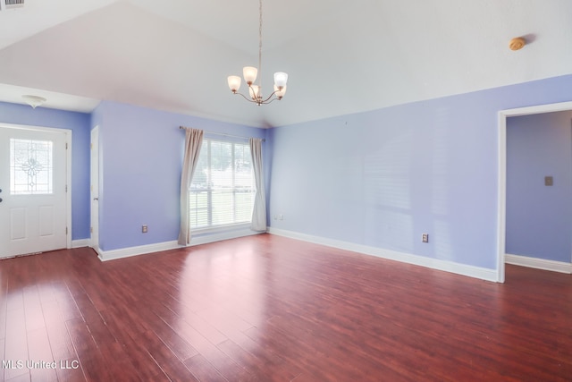 6909 N Rue Mornay, Biloxi, MS 39532 - spare room with a smoke detector, a chandelier, vaulted ceiling, healthy amount of natural light, and wood finished floors