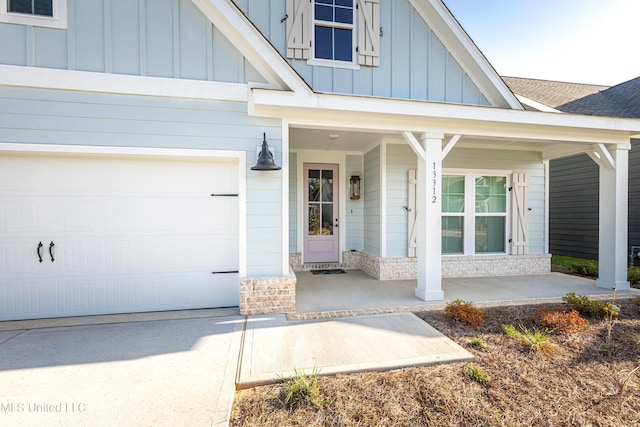 view of exterior entry featuring a porch