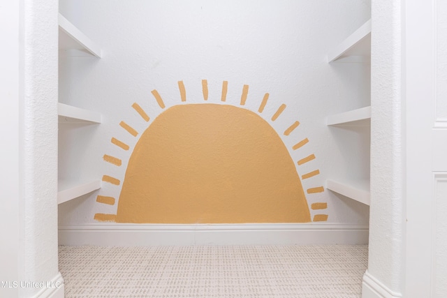 walk in closet featuring tile patterned floors