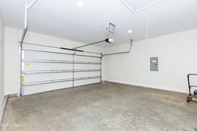 garage featuring a garage door opener and electric panel