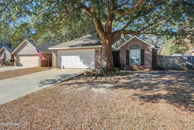 ranch-style home featuring a garage