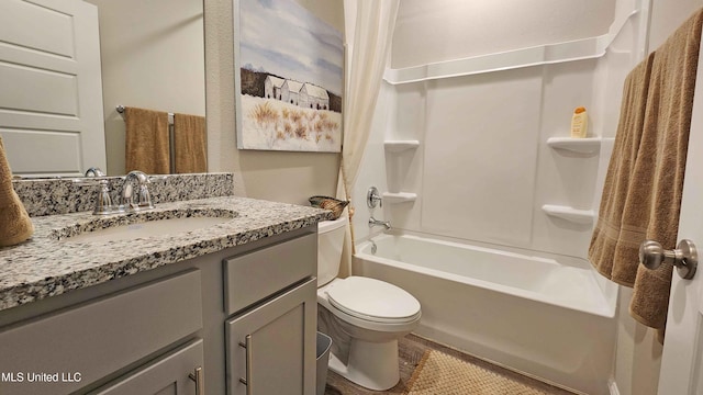 full bathroom featuring vanity, toilet, shower / tub combination, and wood-type flooring