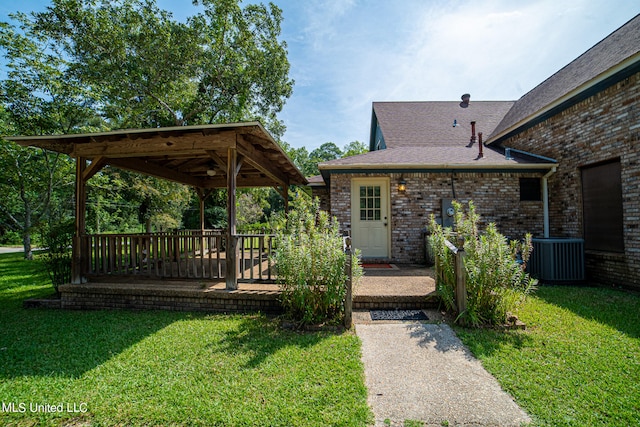 exterior space with a gazebo and central AC unit