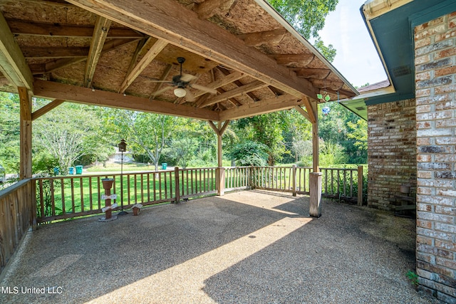 view of patio / terrace featuring a gazebo and ceiling fan