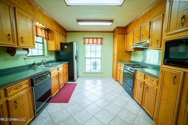 kitchen featuring light tile patterned flooring, crown molding, black appliances, and sink