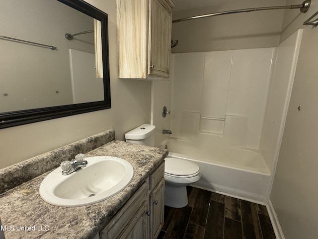 full bathroom with vanity, toilet, and shower / washtub combination