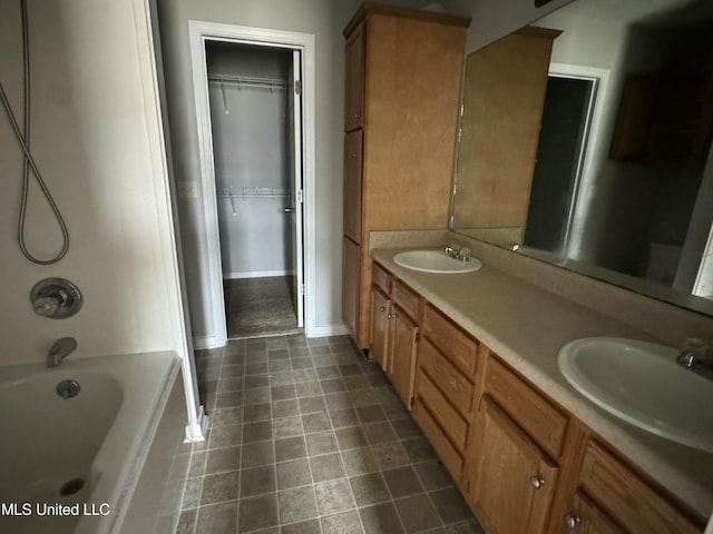 bathroom featuring shower / tub combination and vanity