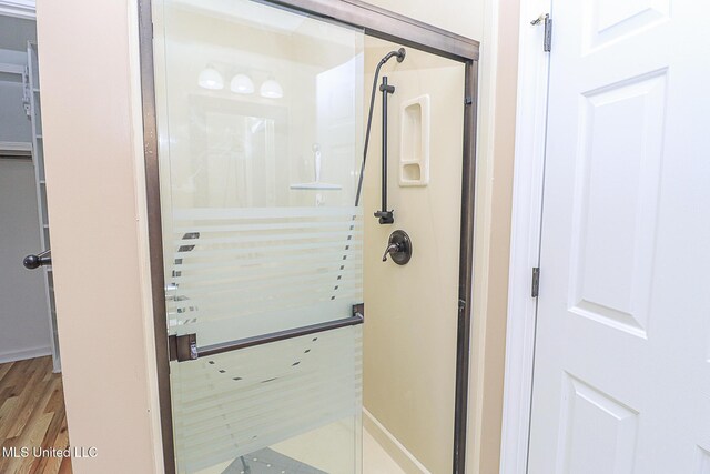 entryway featuring light wood-style floors and baseboards