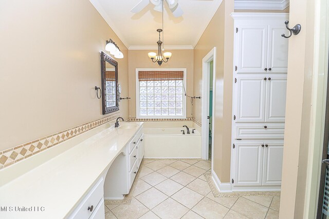 bathroom featuring a garden tub, vanity, tile patterned floors, ceiling fan with notable chandelier, and ornamental molding