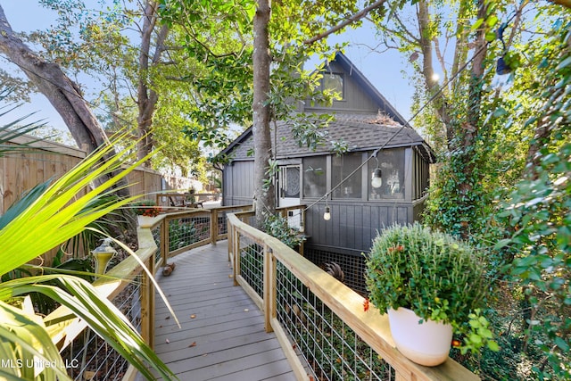 exterior space featuring a sunroom