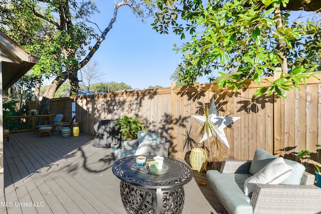 deck featuring an outdoor living space