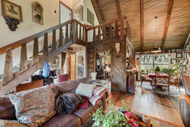 living room featuring hardwood / wood-style floors, high vaulted ceiling, wood ceiling, and beamed ceiling