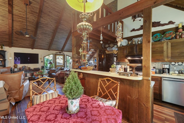 dining area with hardwood / wood-style flooring, beam ceiling, high vaulted ceiling, and indoor bar