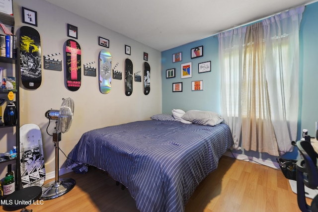 403 Suzanne Ave, Long Beach, MS 39560 - bedroom featuring wood finished floors