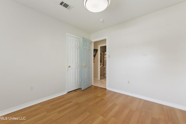 403 Suzanne Ave, Long Beach, MS 39560 - spare room featuring light wood finished floors and a smoke detector