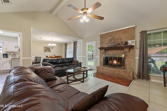 403 Suzanne Ave, Long Beach, MS 39560 - living area with light tile patterned floors, beamed ceiling, a chandelier, a fireplace, and a ceiling fan