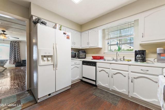 403 Suzanne Ave, Long Beach, MS 39560 - kitchen with white appliances, white cabinetry, dark wood-style floors, and light countertops