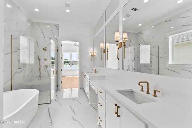 bathroom with vanity, independent shower and bath, and ceiling fan