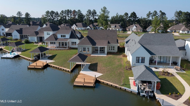 drone / aerial view featuring a water view