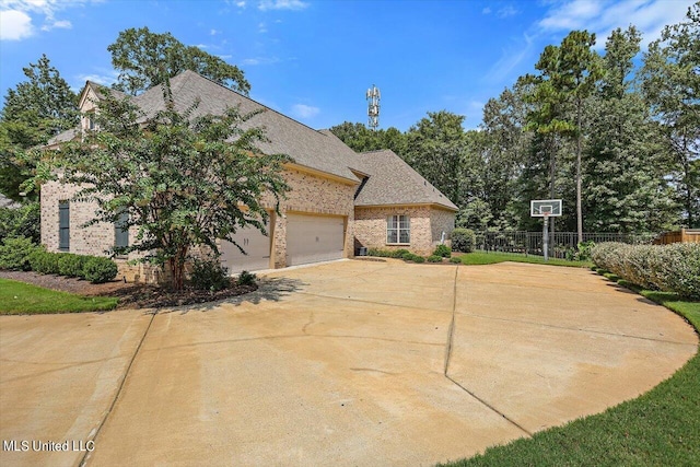 view of front of property with a garage