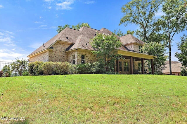 exterior space with a front yard