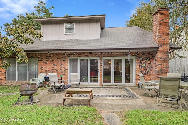 rear view of house featuring a patio area