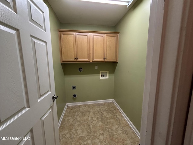 laundry area with washer hookup, cabinet space, electric dryer hookup, and baseboards